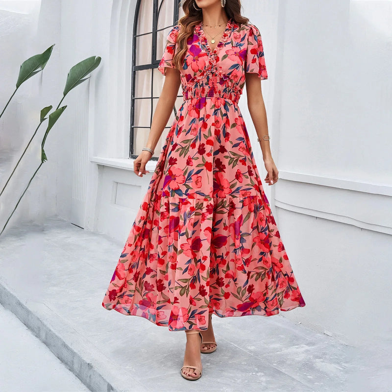 Elke – Stilvolles Kleid mit Blumendruck und V-Ausschnitt und ausgestellten Ärmeln
