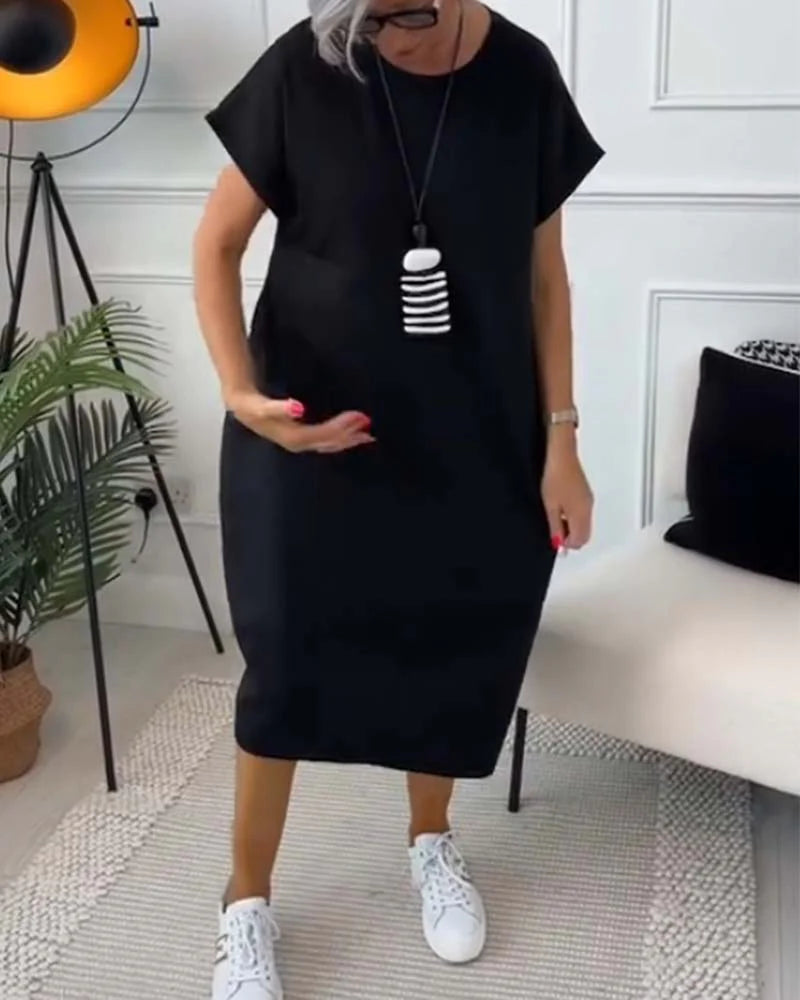 Sunniva – Stylisches Kurzarmkleid mit Rundhalsausschnitt und Taschen
