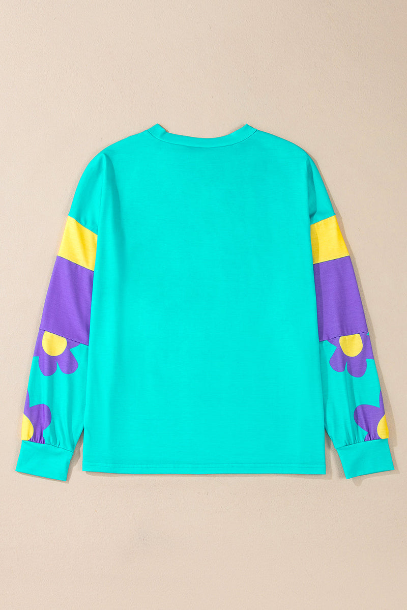 Maya – Modernes Langarmshirt mit floralen Akzenten und Blockdesign