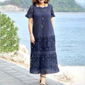 Emma – Elegantes Blumenkleid mit kurzen Ärmeln und Rüschenakzenten