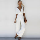 Zinka - Stylischer Jumpsuit mit tiefem V Ausschnitt und weiten Hosenbeinen