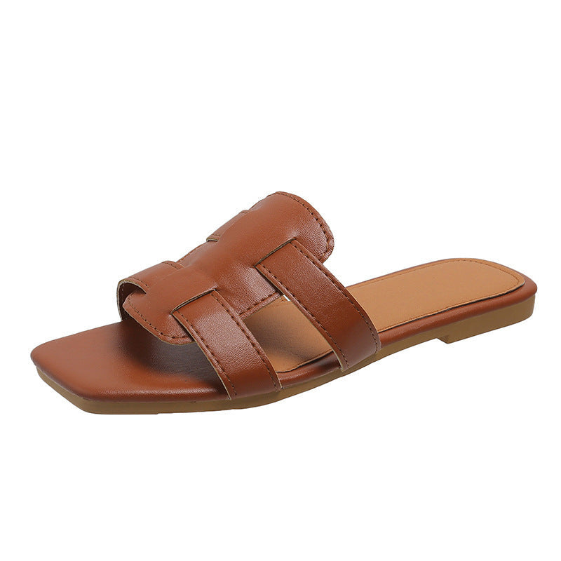 Nora – Trendy flache Slide-Sandalen mit breiter Riemenanordnung und offenem Zehendesign