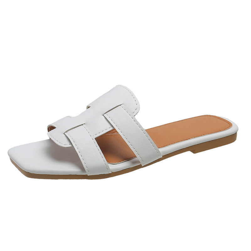 Nora – Trendy flache Slide-Sandalen mit breiter Riemenanordnung und offenem Zehendesign