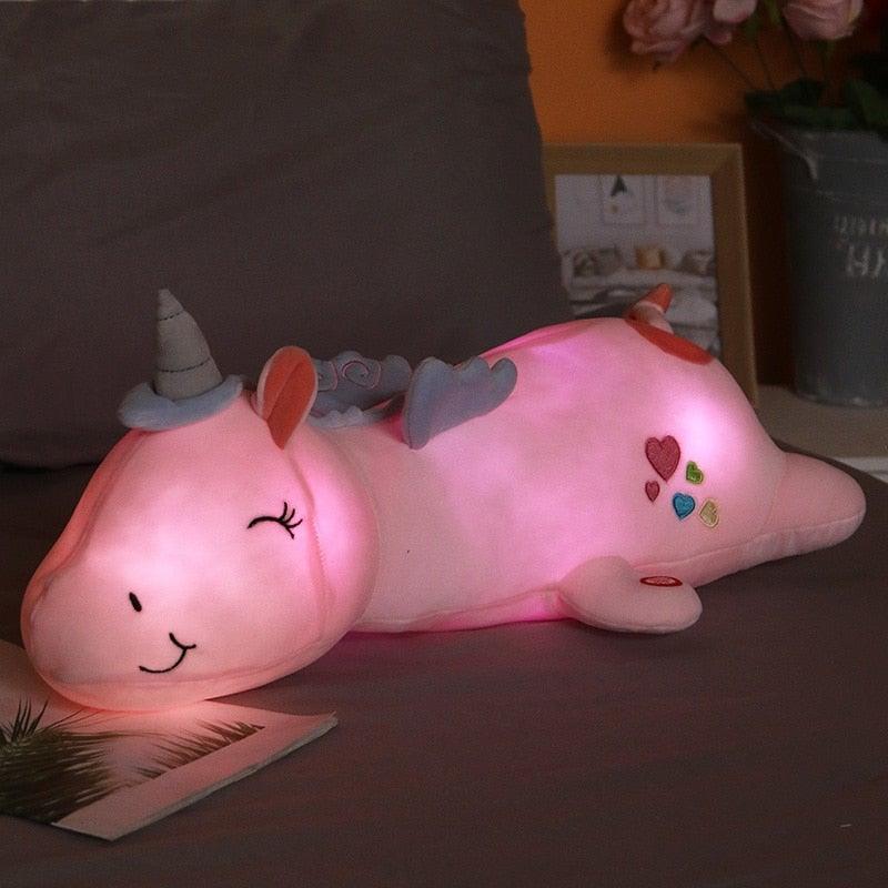 DreamGlow - Weiches und kuscheliges Regenbogen Einhorn Plüsch mit leuchtender Nachtlicht Funktion