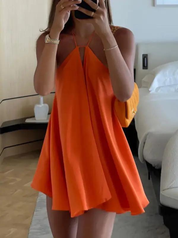 Maya – Ausgestelltes Minikleid mit tiefem Rückenausschnitt und verstellbarer Schleife