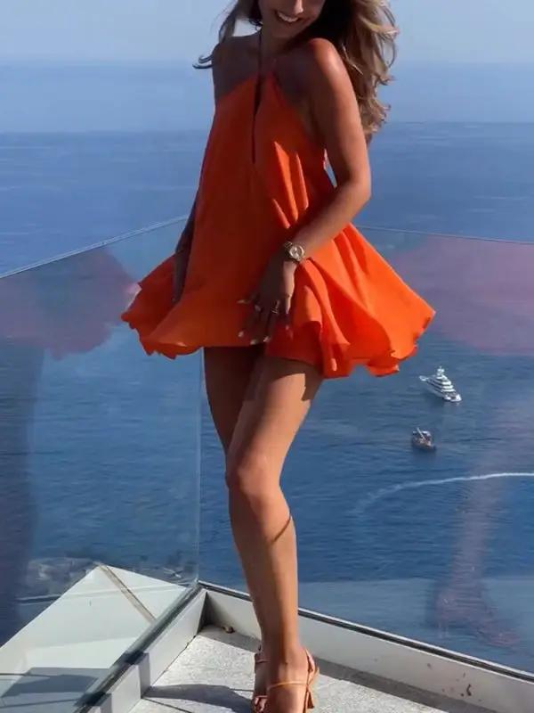 Maya – Ausgestelltes Minikleid mit tiefem Rückenausschnitt und verstellbarer Schleife