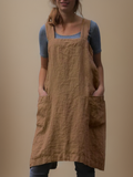 Elina – Luftiges Schürzenkleid mit fließender Form und raffinierten Taschendetails