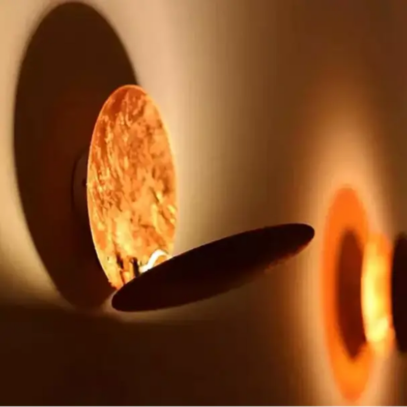 LumaDisc – Drehbare runde Wandleuchte mit LED Beleuchtung