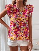 Anna – Stylisches florales Rüschentop mit kurzen Ärmeln und Rundhalsausschnitt