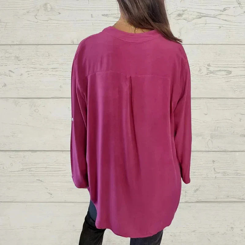 Merry – Stilvolles Langarmshirt mit V-Ausschnitt Knöpfen und Tasche