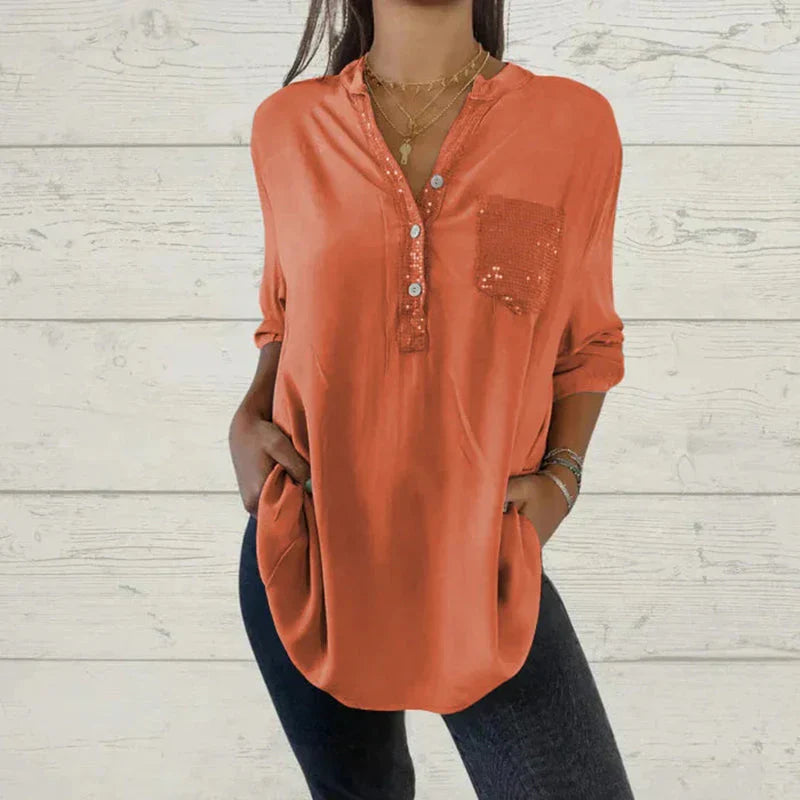 Merry – Stilvolles Langarmshirt mit V-Ausschnitt Knöpfen und Tasche