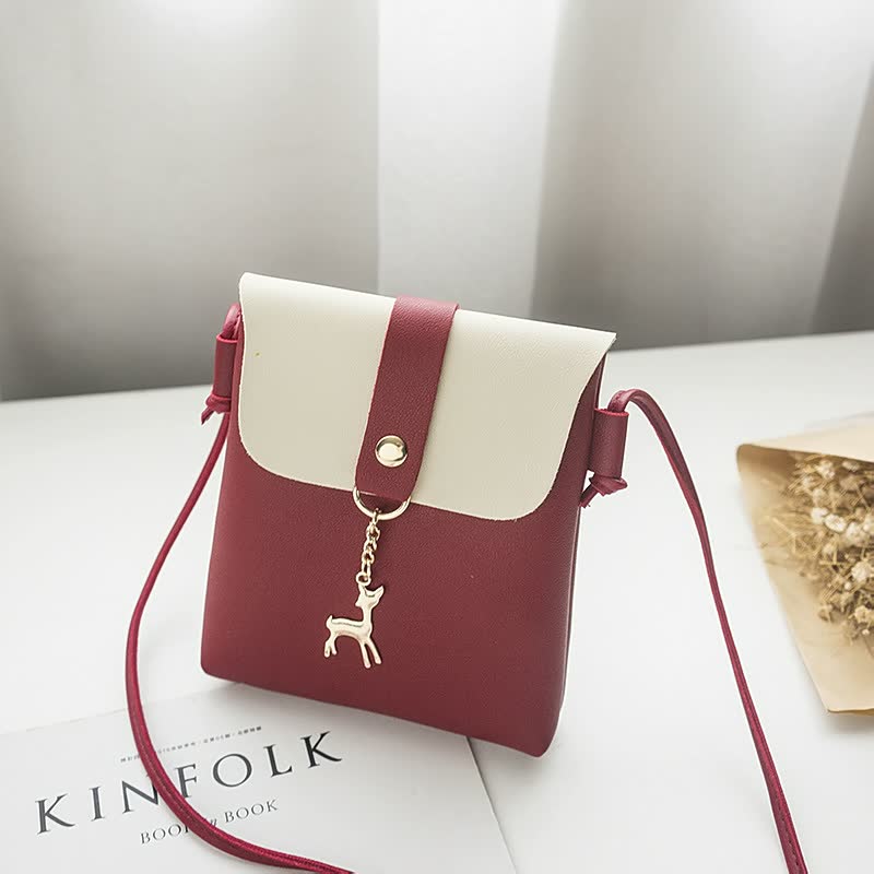 Dalia – Kompakte quadratische Handtasche mit Henkel und sicherem Verschluss