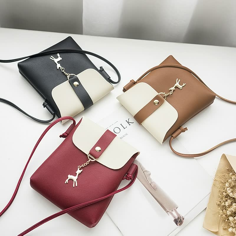 Dalia – Kompakte quadratische Handtasche mit Henkel und sicherem Verschluss