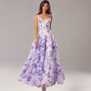 Anke - Modisches ärmelloses langes Blumenkleid mit Schleifendetails und hoher Taille