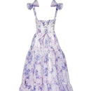 Anke - Modisches ärmelloses langes Blumenkleid mit Schleifendetails und hoher Taille