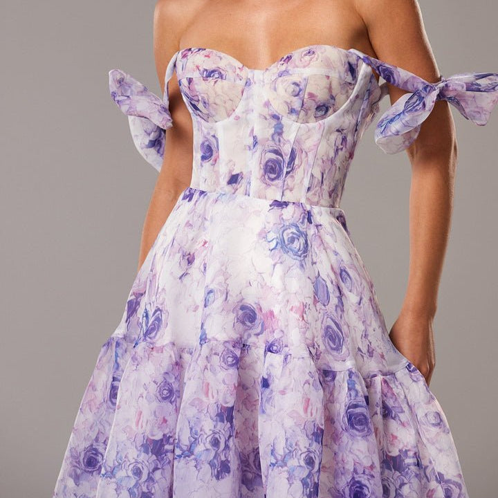 Anke - Modisches ärmelloses langes Blumenkleid mit Schleifendetails und hoher Taille