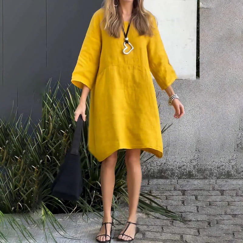 Romy – Locker geschnittenes Minikleid mit langen Ärmeln und Taschendesign