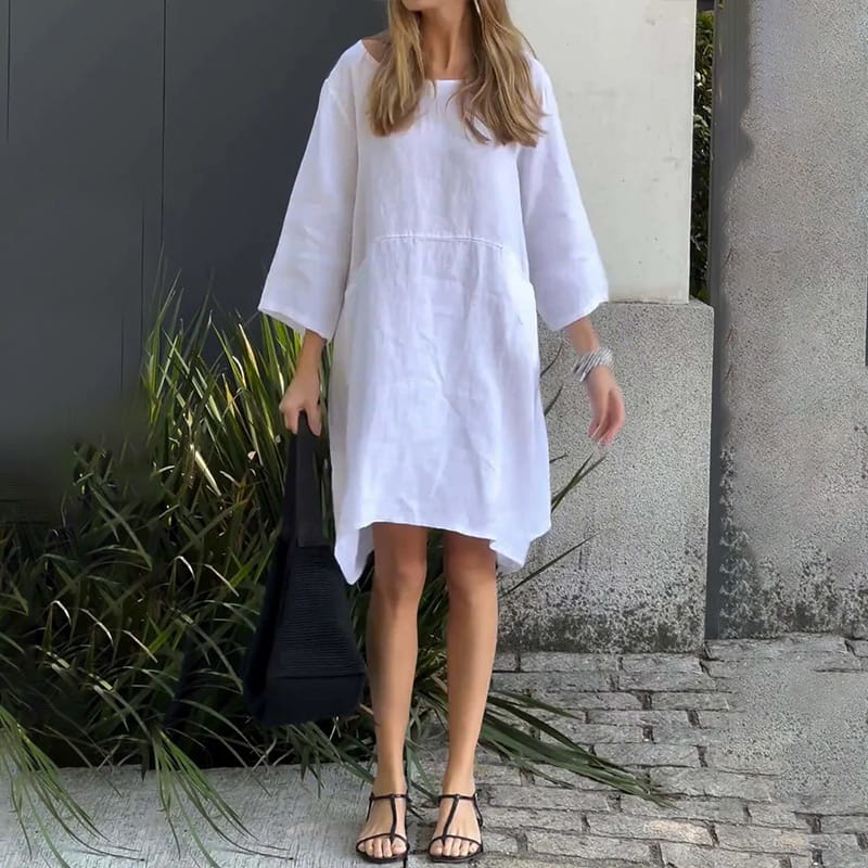 Romy – Locker geschnittenes Minikleid mit langen Ärmeln und Taschendesign