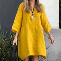 Romy – Locker geschnittenes Minikleid mit langen Ärmeln und Taschendesign