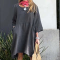 Romy – Locker geschnittenes Minikleid mit langen Ärmeln und Taschendesign