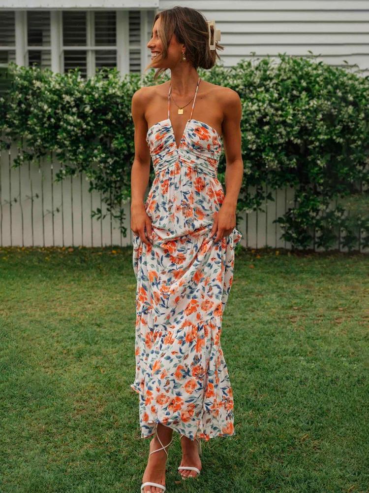 Alina – Stilvolles ärmelloses langes Kleid mit Blumendruck und Neckholder V Ausschnitt