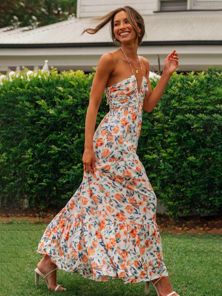 Alina – Stilvolles ärmelloses langes Kleid mit Blumendruck und Neckholder V Ausschnitt
