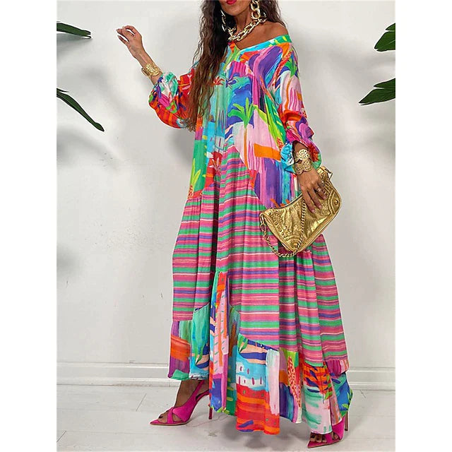 Yasmin – Langärmliges figurbetontes Kleid mit geometrischem Muster und flüssiger Passform